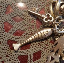 Bettelarmband Silber mit Fisch, Schlüssel, Skarabäus uvm
